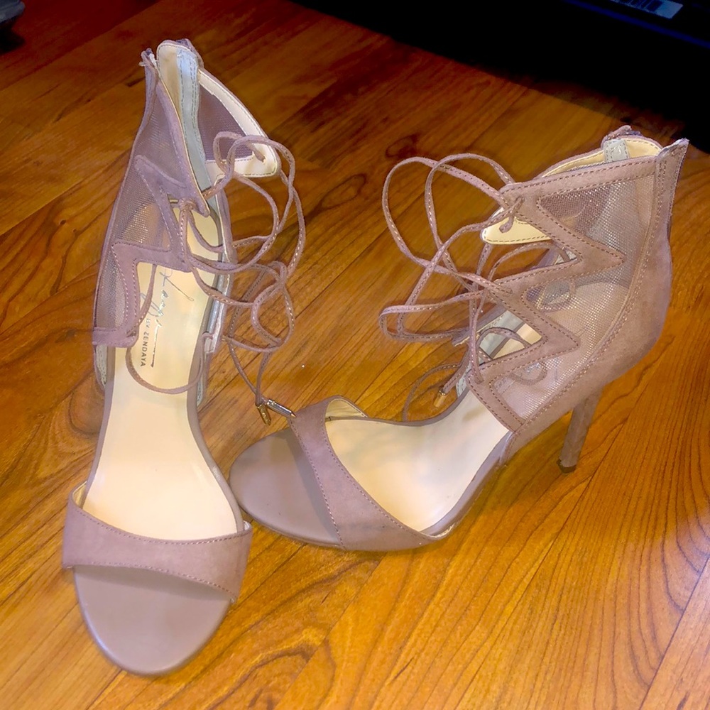 Daya by Zendaya. Lace up zipper back heel. Worn once.